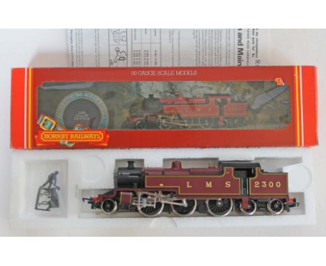 Hornby Railways OO gauge scale LMS Class 4P R055 locomotive  4-6-4 Tank with crew and vacuum pipes, boxed. Condition - appear