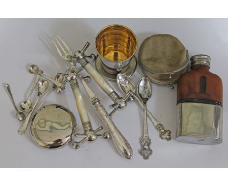 A mixed lot to included 5 hallmarked silver mustard spoons, plated knife rests, plated hip flask etc.