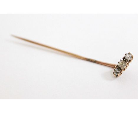 A yellow metal diamond stick pin, length 4.8cm, gross wt. 0.9g.