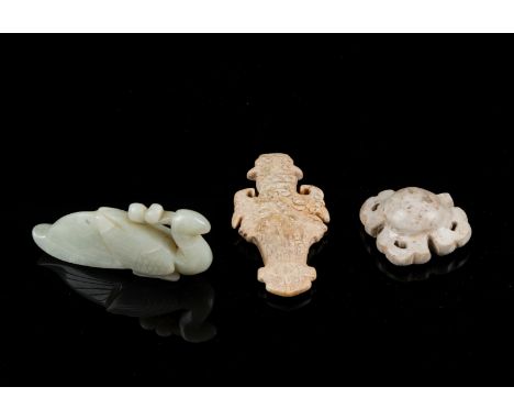 Chinese Art Three jade carvingsChina, various periods. . Cm 5,00 x 9,00. A bird l 8cm h 4,5cm A Vajra carving (one end missin
