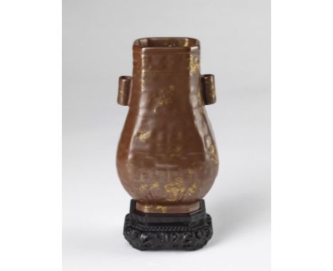 Chinese Art A partially gilded brown glazed hu shaped porcelain vase bearing a Qianlong zhianshu six character mark at the ba