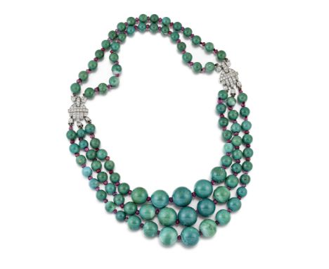 CARTIER: GEM-SET BEAD AND DIAMOND NECKLACE, CIRCA 1925The front set with three rows of graduating turquoise beads alternating