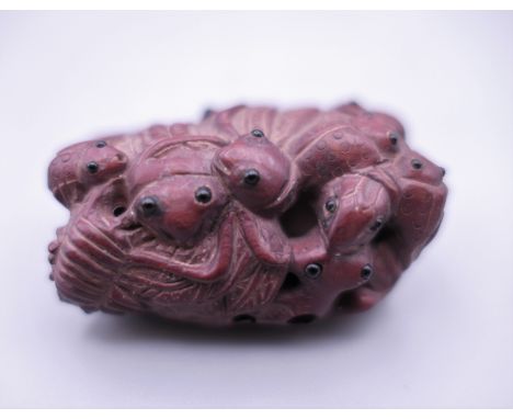 A Japanese netsuke formed as various insects. 5 cm high.