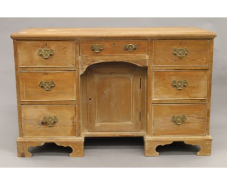 A 19th century pine desk. 116 cm wide.