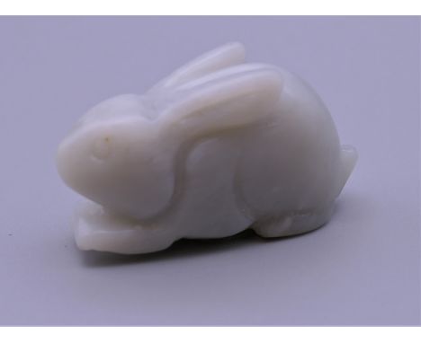 A jade carving of a rabbit. 4.5 cm long.
