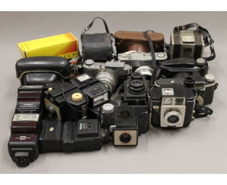 A quantity of various camera equipment.