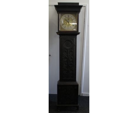 An eight-day carved oak cased longcase clock, the dial inscribed Henry Rendell Tiverton. 195 cm high.