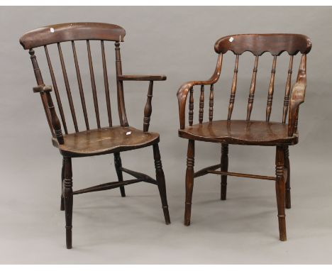 A Victorian elm seated stick back armchair and another.