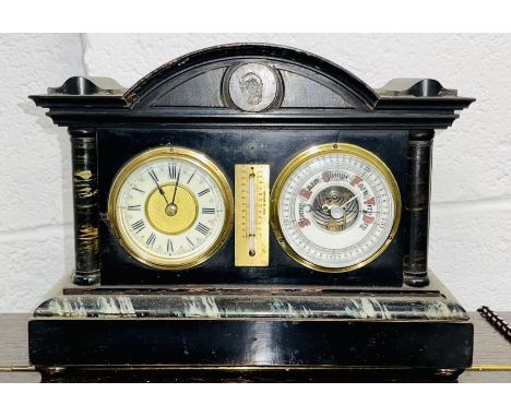 A wooden mantel clock, barometer and thermometer with slate effect paint.