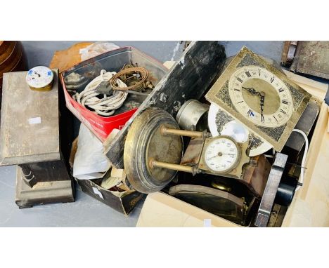 A workshop lot, clock cases, faces, movements and other items (2)