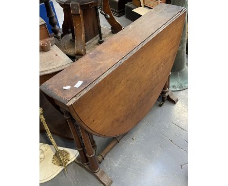 One mahogany gate leg drop leaf table.