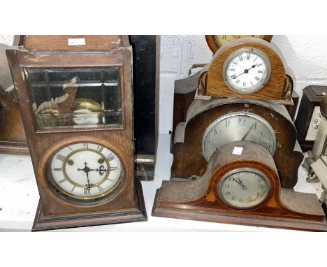 Three clocks including two 1940s mantel clocks and one Napoleon clock with barrel movement. (3)