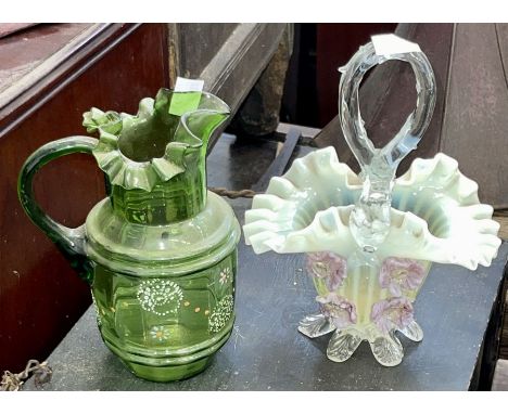 Two items of decorative Victorian glass, one in the form of a basket with thorn handle, one jug with enamel decoration and fl