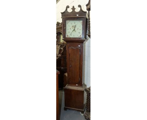 An 18th century R Evan of Shrewsbury long case clock. Oak with mahogany banding reeded columns scroll top, painted dial with 