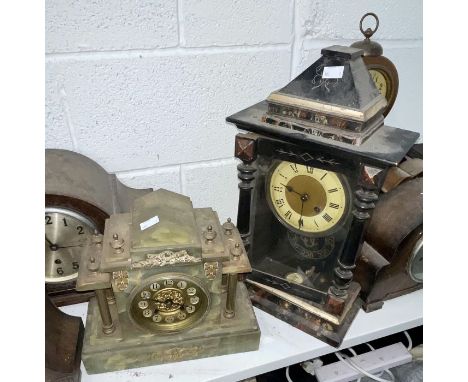 Two mantel clocks. One green onyx and brass mantel clock with column detail along with one wooden mantel clock with marble pa