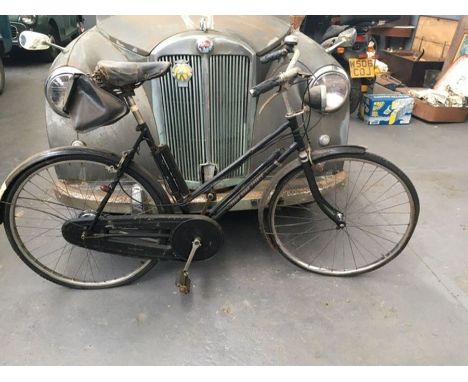 A 1950s/60s lady’s step through Robin Hood roadster. 