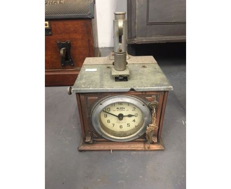 A small Blick time recorder clock with copper case