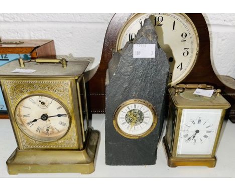 Two brass carriage clocks with enamel faces and one slate clock (3)