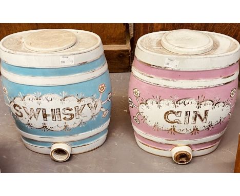 Two 19th century hand painted ceramic spirit barrels with lids for whisky and gin.