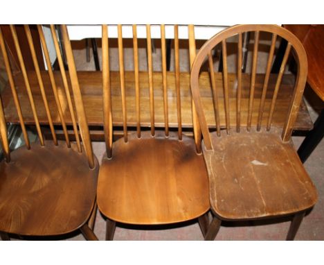 AN OAK BENCH TOGETHER WITH TWO ERCOL CHAIRS PLUS ANOTHER 