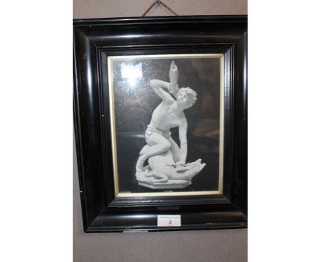 A FRAMED AND GLAZED PRINT OF A MALE SCULPTURE 
