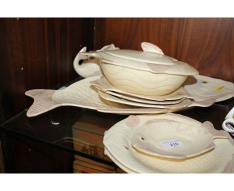 A SELECTION OF FISH SHAPED PLATES, TUREEN, ETC