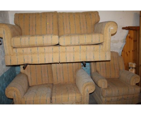 A GAINSBOROUGH UPHOLSTERED THREE PIECE SUITE AND STOOL 