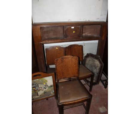 AN OAK FIRE SURROUND TOGETHER WITH THREE CHAIRS, TWO MIRRORS AND A FIRE SCREEN
