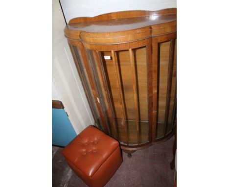 A CHINA DISPLAY CABINET TOGETHER WITH A PINK POUFFE 