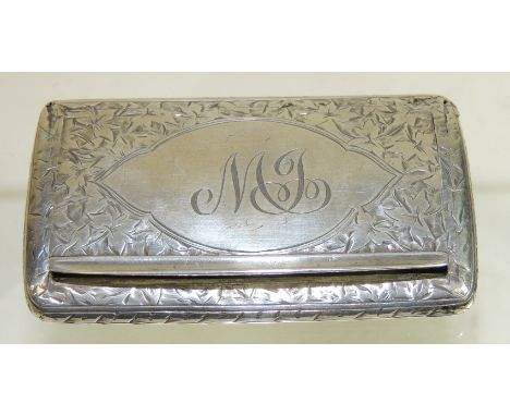 A silver snuff box, hallmarked for London 1870, gilt interior, hinged lid and with all over foliate engraved decoration, init