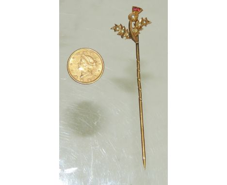 A 9ct gold tie pin with thistle finial set with seed pearls and two tiny rubies and a small gold USA 1 dollar 1849 (2)