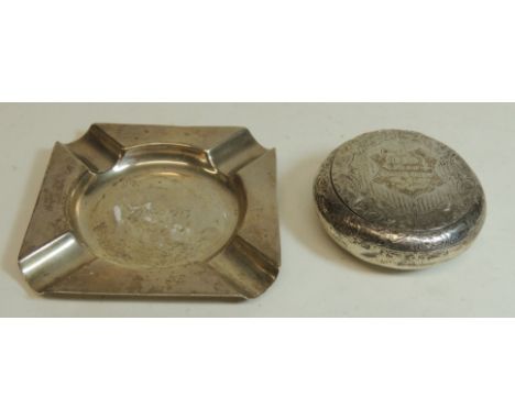 A circular squeeze open silver snuff box A/F hallmarked for Birmingham 1907, scroll and leaf engraved decoration with present