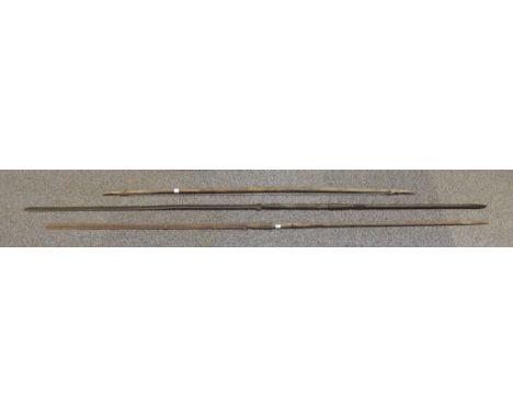 Two Masai lion hunting spears, each having long slender blade to one end and shorter pointed spike to the other, 213cms and 1