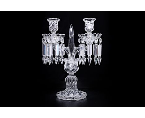 A BACCARAT CRYSTAL TWO LIGHT CANDELABRA With spirally fluted base, two faceted branches, the conforming sconces and drop pans