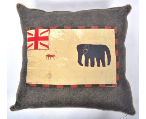 Andrew Martin - A contemporary high end designer fabric cushion having grey front with embroidered central panel with Union J