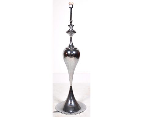 A large contemporary polished metal floor standing lamp light having a turned stem over a bulbous body with waisted centre an