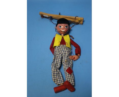 A BOXED PELHAM PUPPET of a peasant boy with instruction leaflet