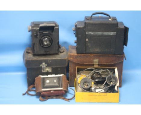 AN ENSIGN SPECIAL REFLEX BOX CAMERA, together with a Graflex camera in fitted leather case, an Ensign 820 etc.