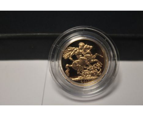 A QEII 2011 PROOF SOVEREIGN in case of issue with certificate of authenticityThe coin is in proof condition, light marks to t