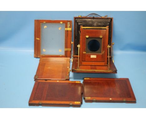 A 'W. WATSON' MAHOGANY PLATE CAMERA in leather case, maker's name plate to front A/F, no lens, not complete