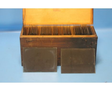 A BOX OF MAGIC LANTERN SLIDES of various scenes