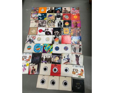 A Quantity of 45 R.P.M. Mixed genre records to include STATUS QUO, ELTON JOHN,THIN LIZZY, CULTURE CLUB, THE JACKSONS, MICHAEL