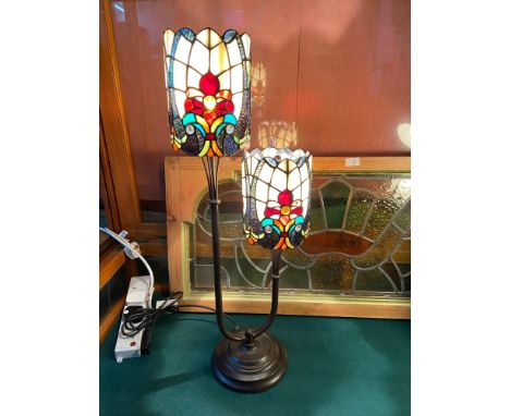 A Two tier Tiffany style table lamp. In a working condition. [74cm height] 