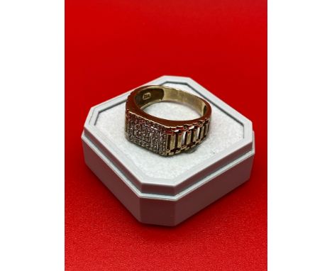 A Gent's 9ct gold and diamond Greek key design ring. [4.69grams] [Ring size R] 