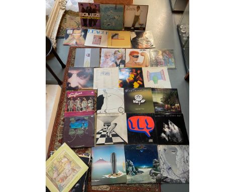 A Large collection of mixed genre LP Records to include Yes,T-REX, FLEETWOOD MAC, JOHNNY CASH, JOAN ARMATRADING, LOUIS ARMSTR