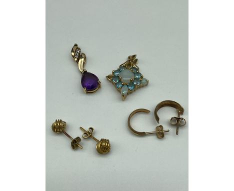 A Lot of 9ct gold jewellery which includes diamond and amethyst pendant, Two pairs of 9ct gold earrings and a 9ct gold aqua m