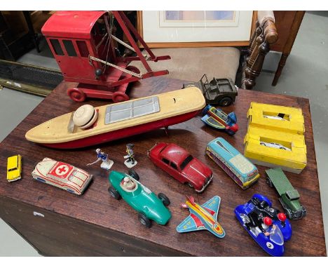 A Quantity of vintage tin plate and other car, boat models, Includes Tri-Ang crane, Tin battery operated yacht boat, Tin plat