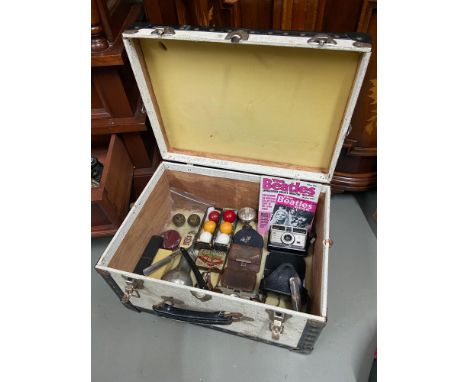 A Small travel trunk containing various collectables to include two small bronze preserve pots, Cut Throat razors, Cameras, B