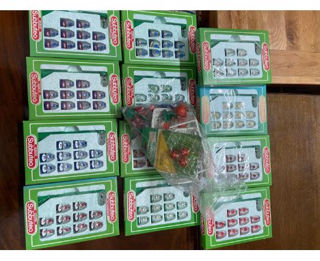 A Collection of vintage boxed Subbuteo football teams and various spares. 