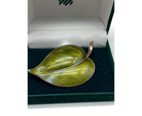 A Norwegian Sterling silver and green enamel leaf design brooch, Maker Aksel Holmsen - Sandefjord. [6.5cm in length] 